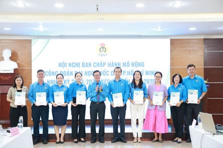 A group of people holding certificatesAI-generated content may be incorrect.